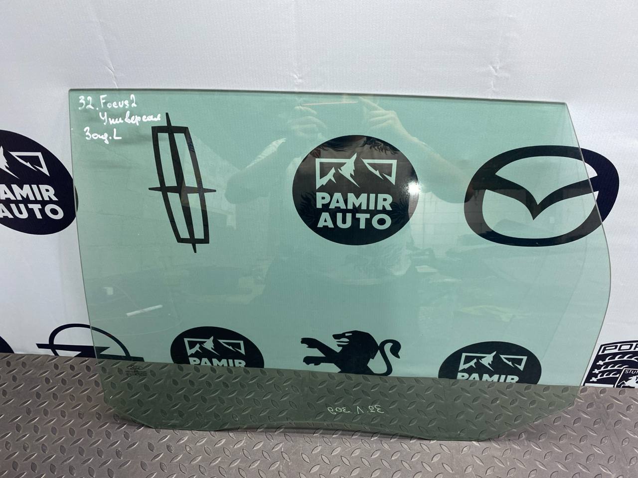 Стекло двери заднее левое Ford Focus/2 2004-2011