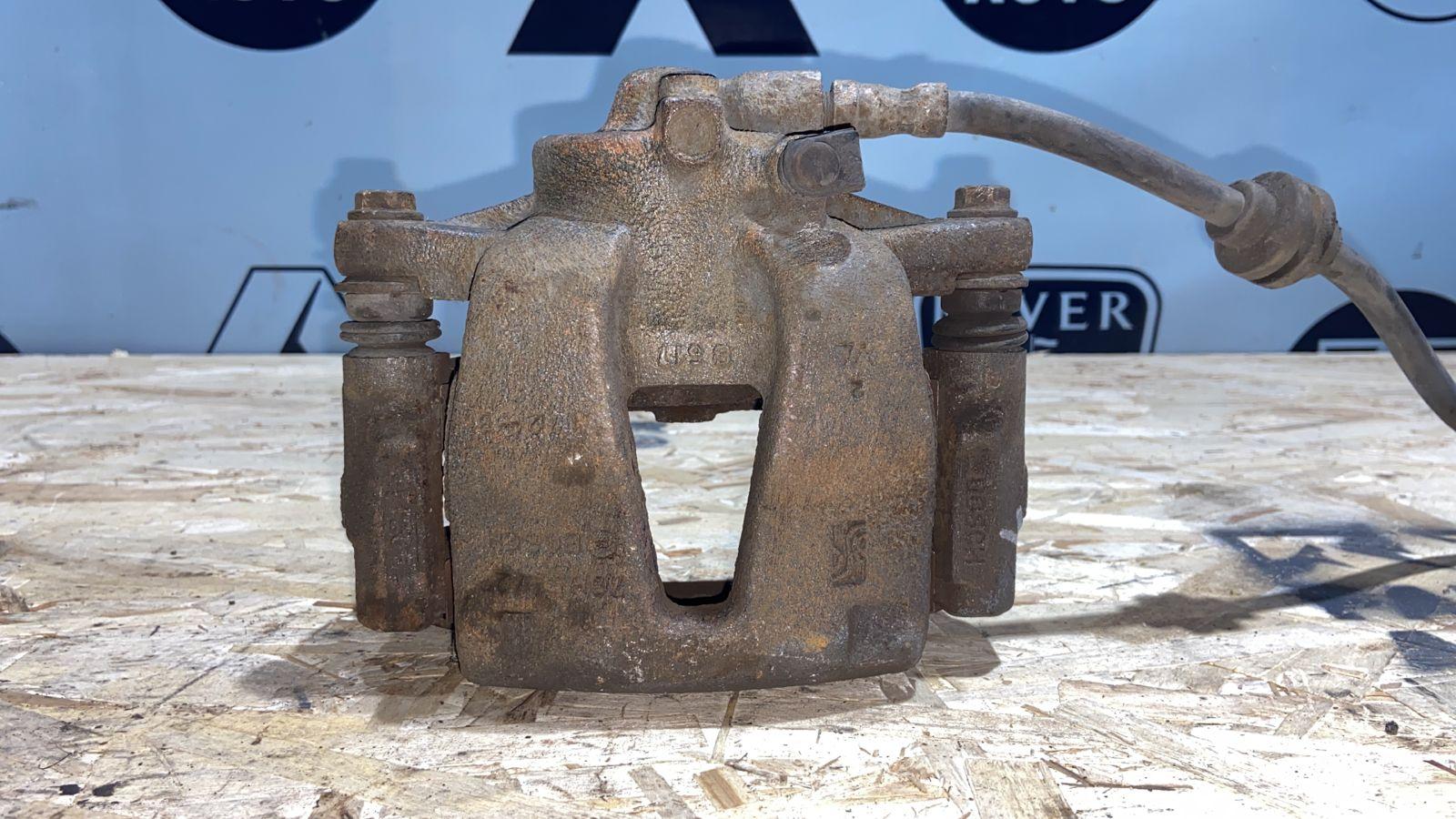 Суппорт передний левый Opel Corsa/D 2006-2014