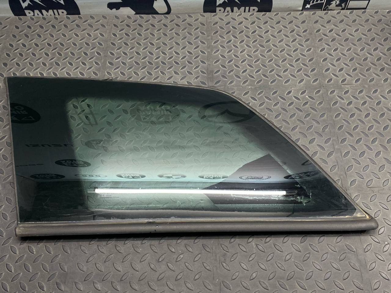 Стекло кузовное глухое заднее левое Opel Astra/H 2004-2014