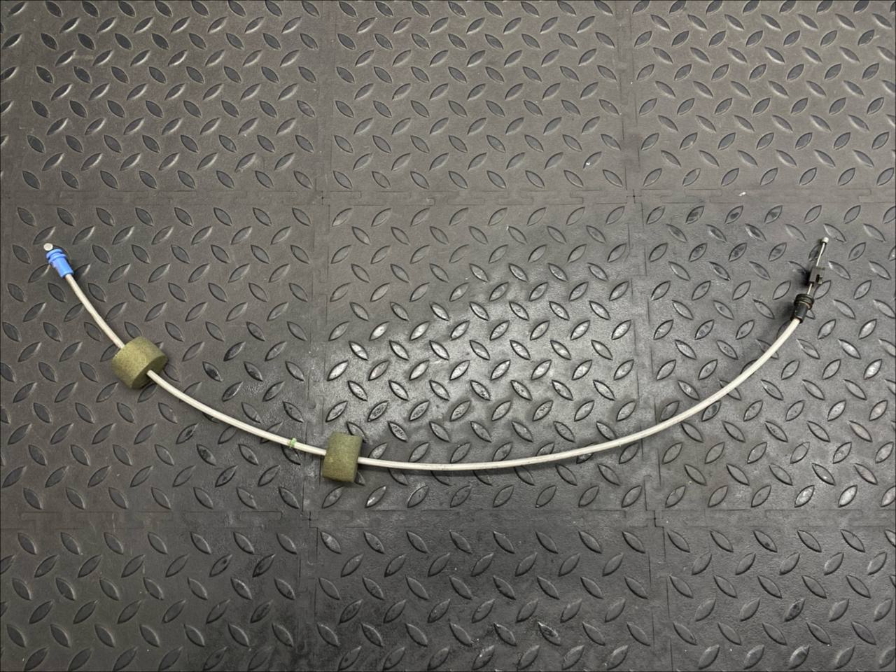 Трос замка двери багажника левый Ford Transit 2000-2006