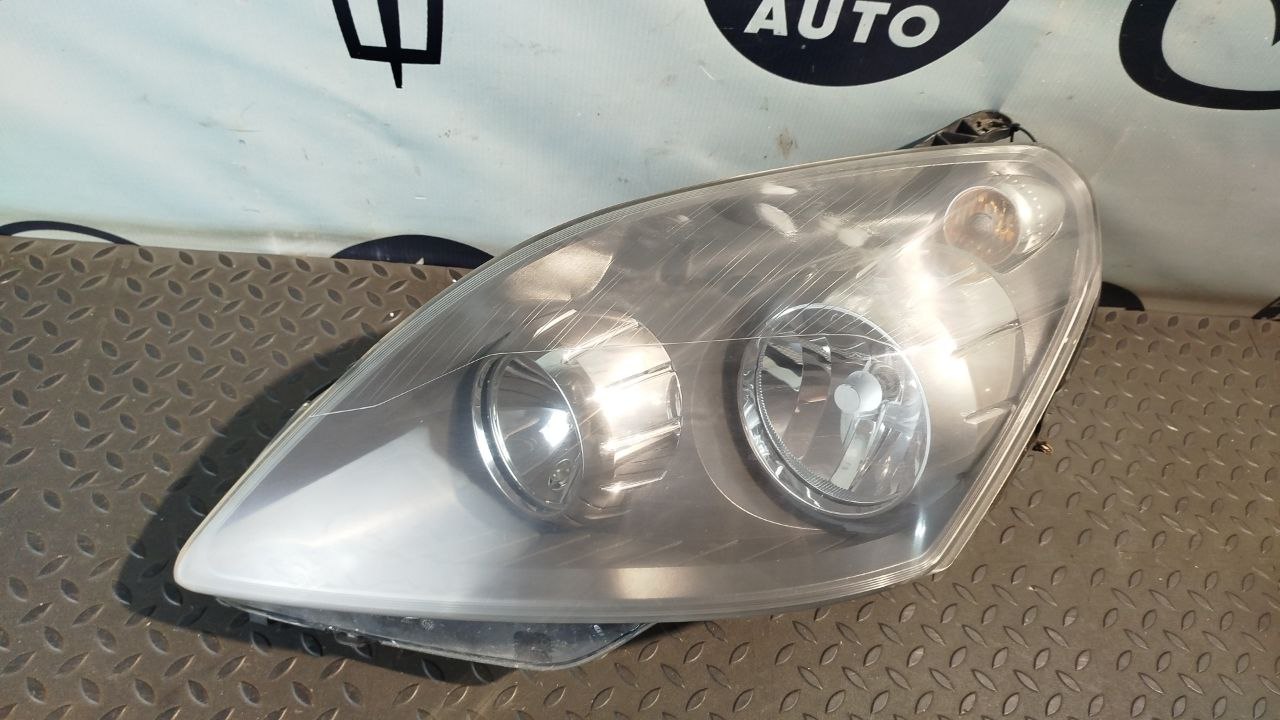 Фара левая Opel Zafira/B 2005-2014