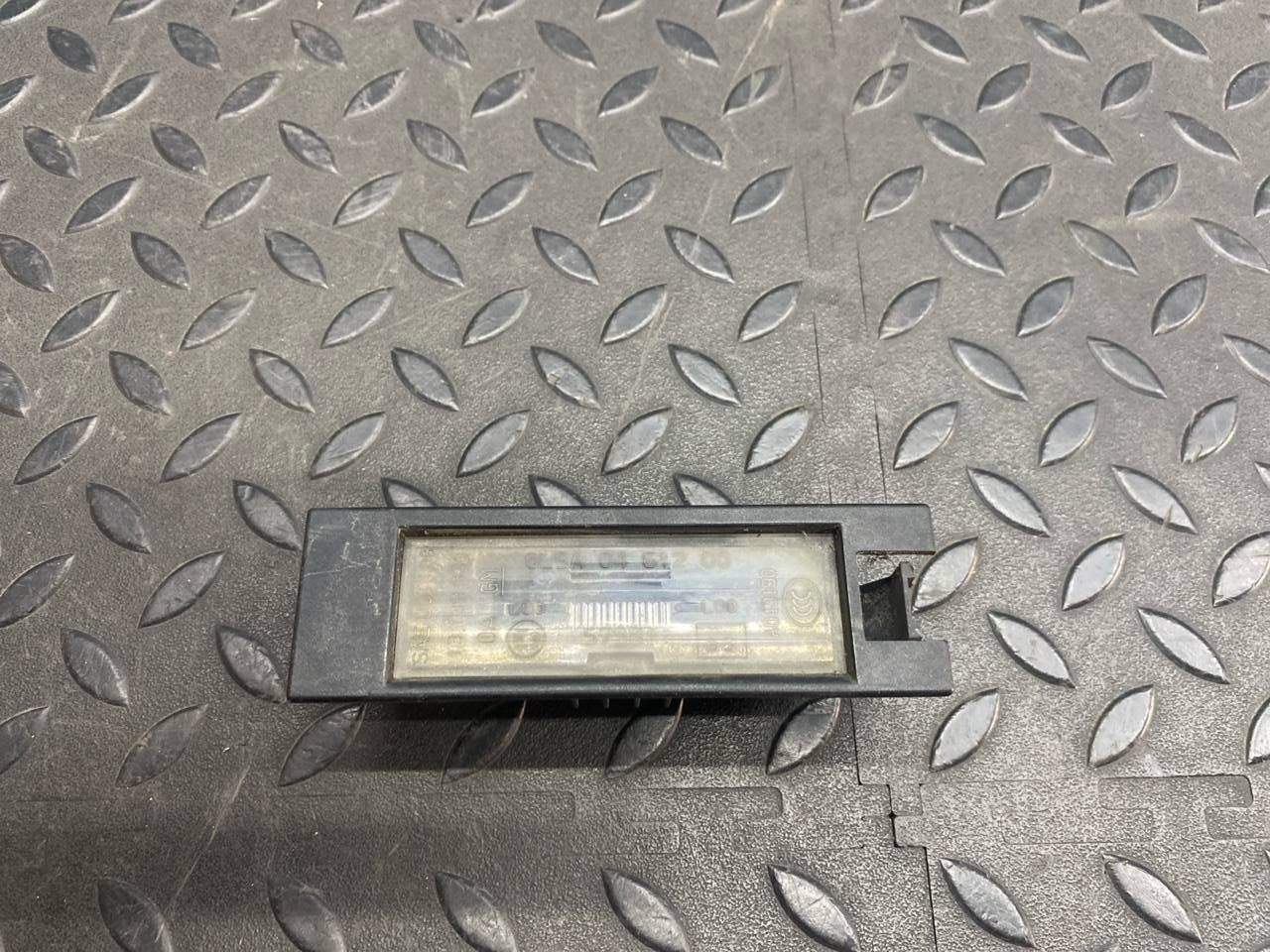 Фонарь подсветки номера Opel Zafira/B 2005-2014