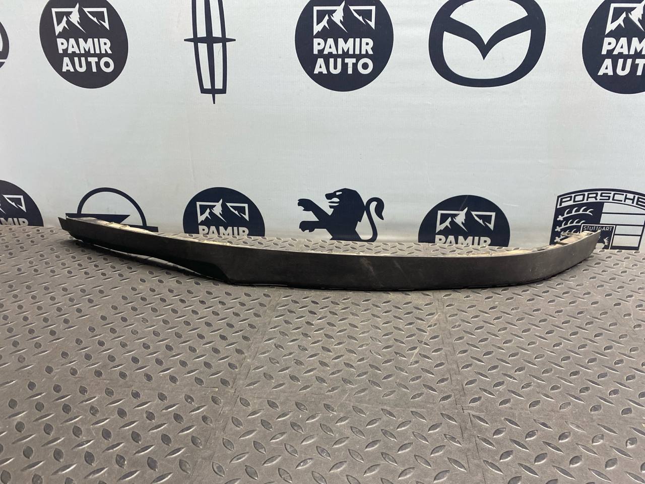 Спойлер бампера (Юбка) левый Opel Astra/H 2004-2014