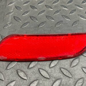 Отражатель в бампер задний левый Ford Focus/2 2004-2011