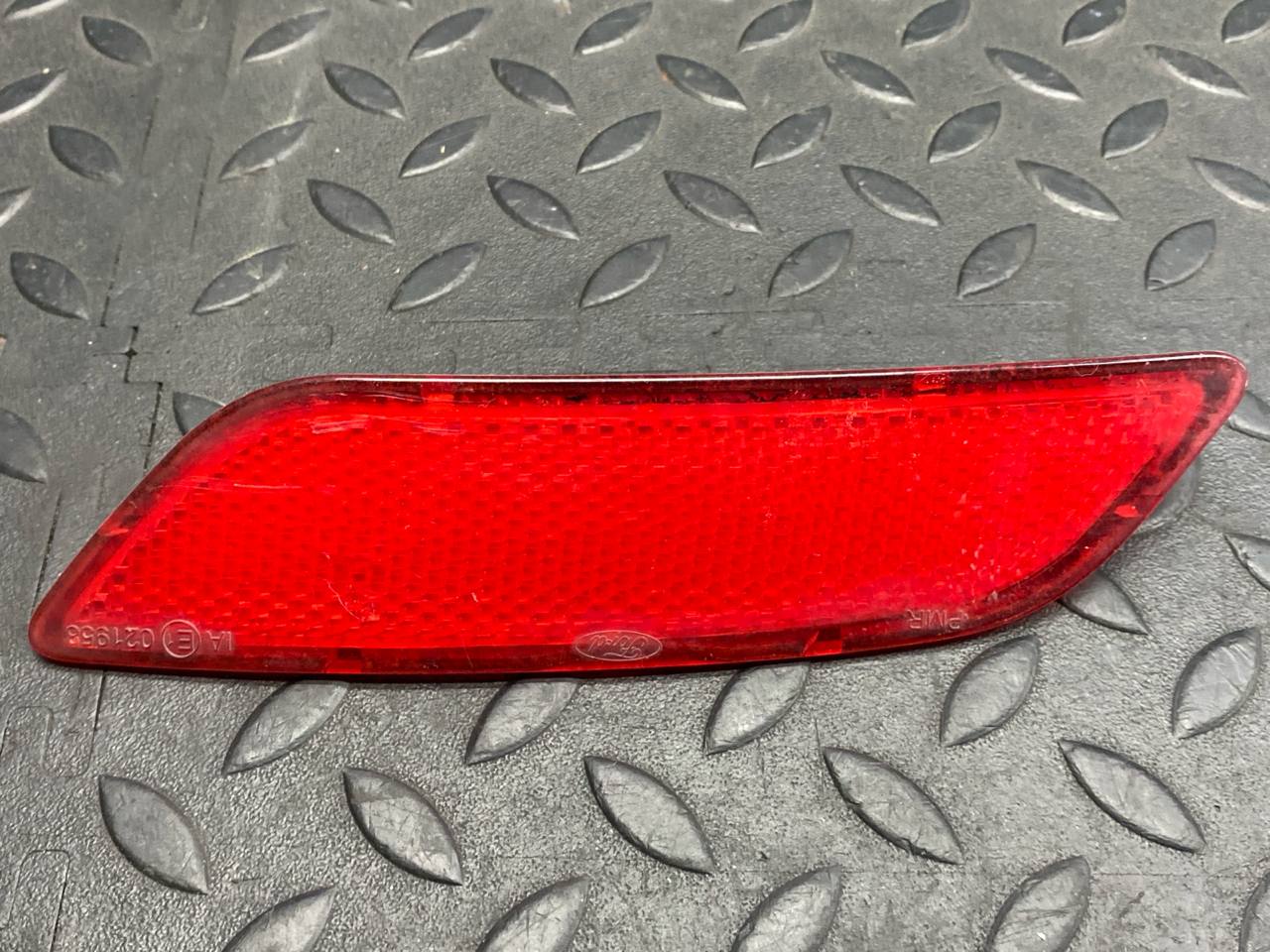 Отражатель в бампер задний левый Ford Focus/2 2004-2011