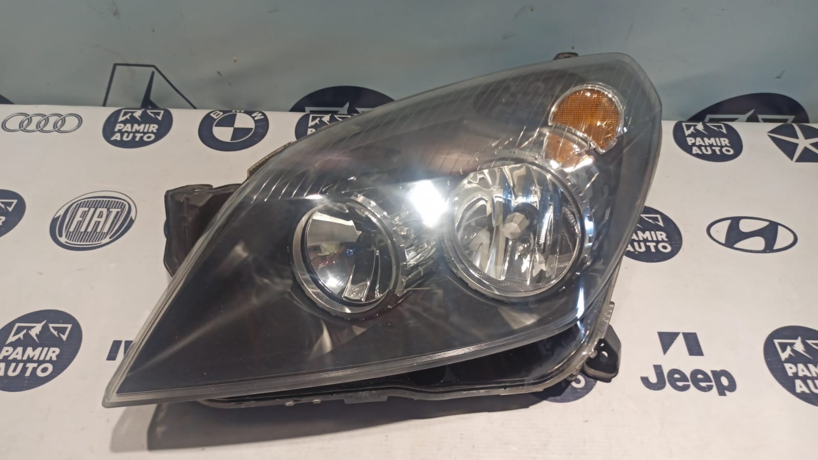 Фара левая Opel Zafira/B 2005-2014