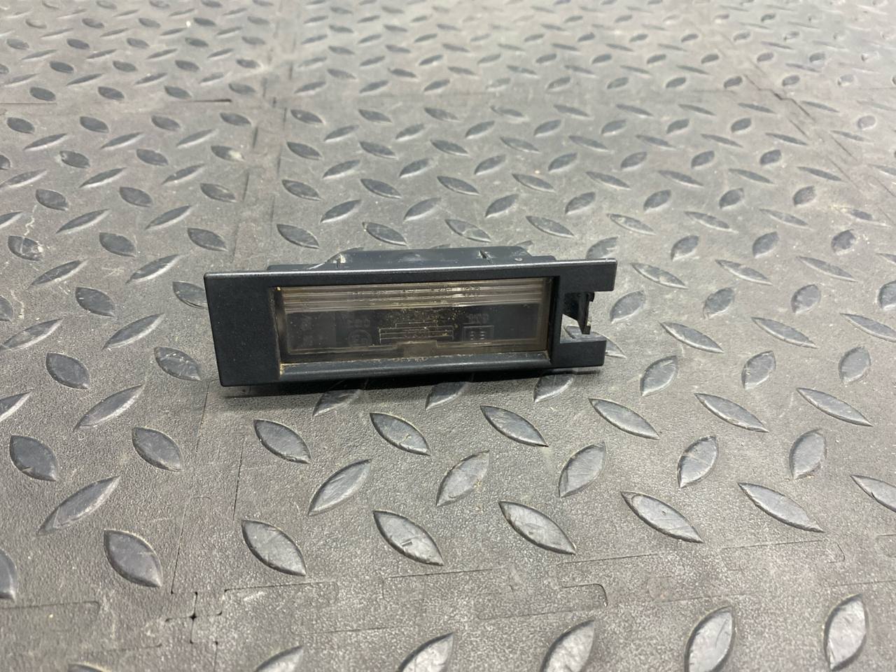 Фонарь подсветки номера Opel Zafira/B 2005-2014