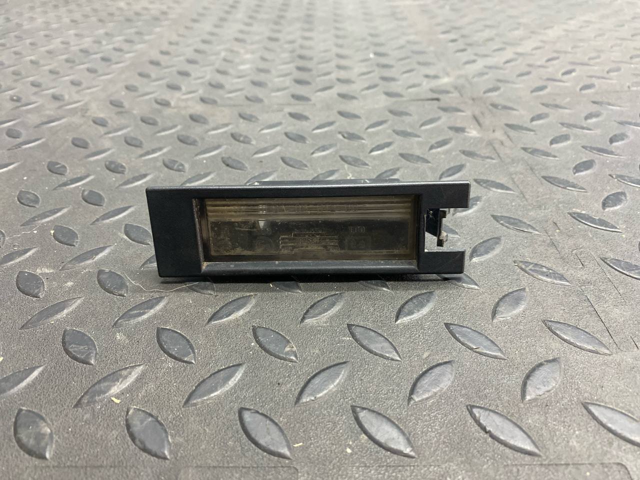 Фонарь подсветки номера Opel Zafira/B 2005-2014