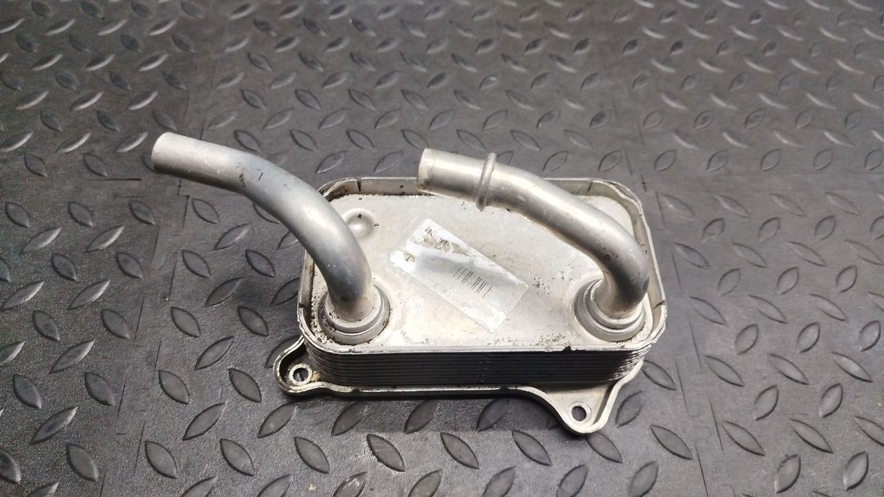 Радиатор масляный (Теплообменник) Mercedes E/W210 1995-2003