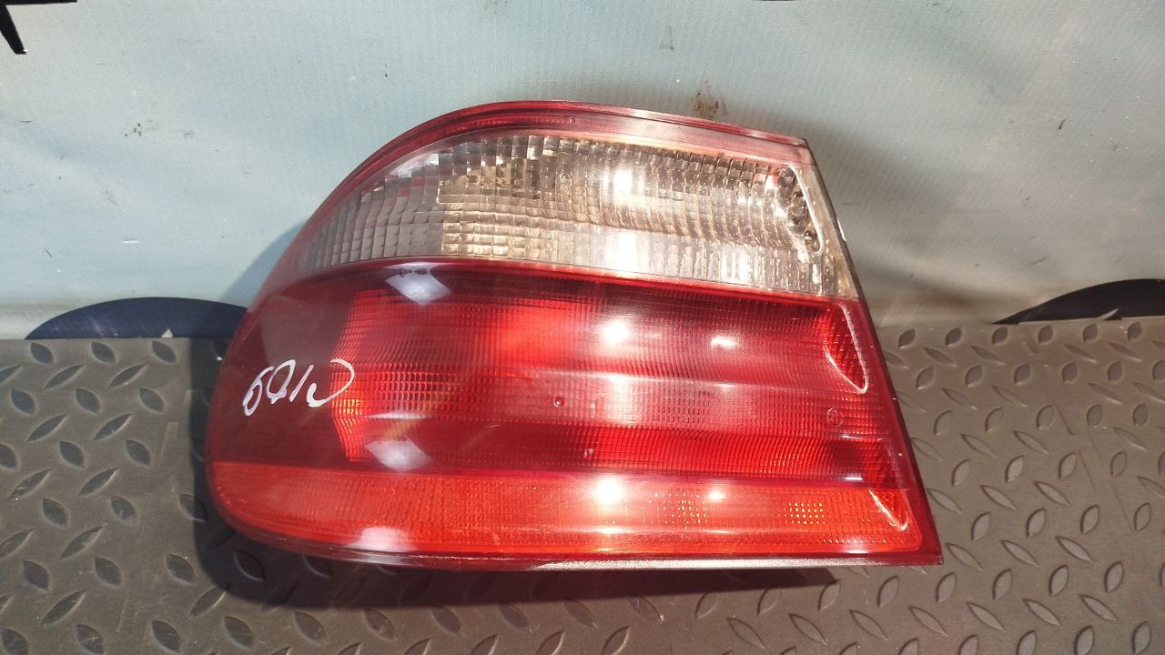Фонарь задний наружный левый Mercedes E/W210 1995-2003