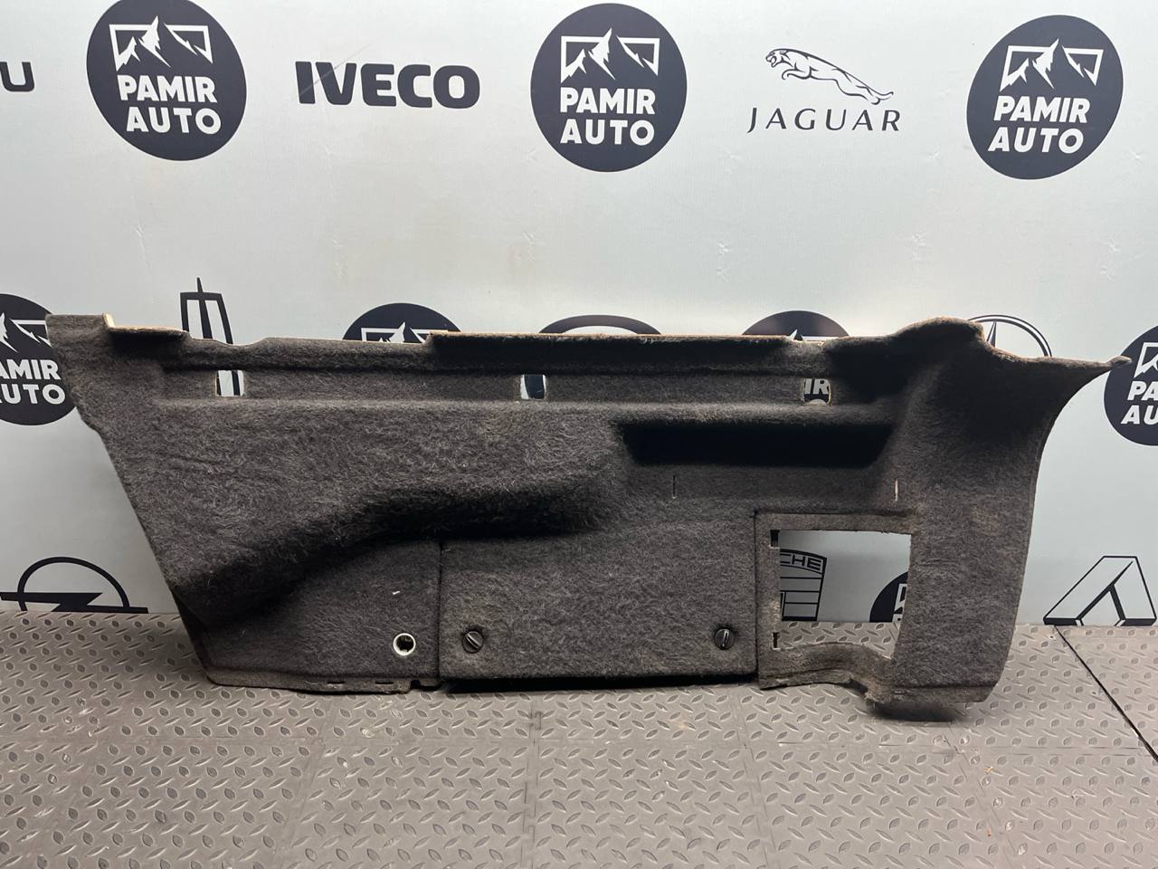 Обшивка багажника левая Opel Astra/H 2004-2014