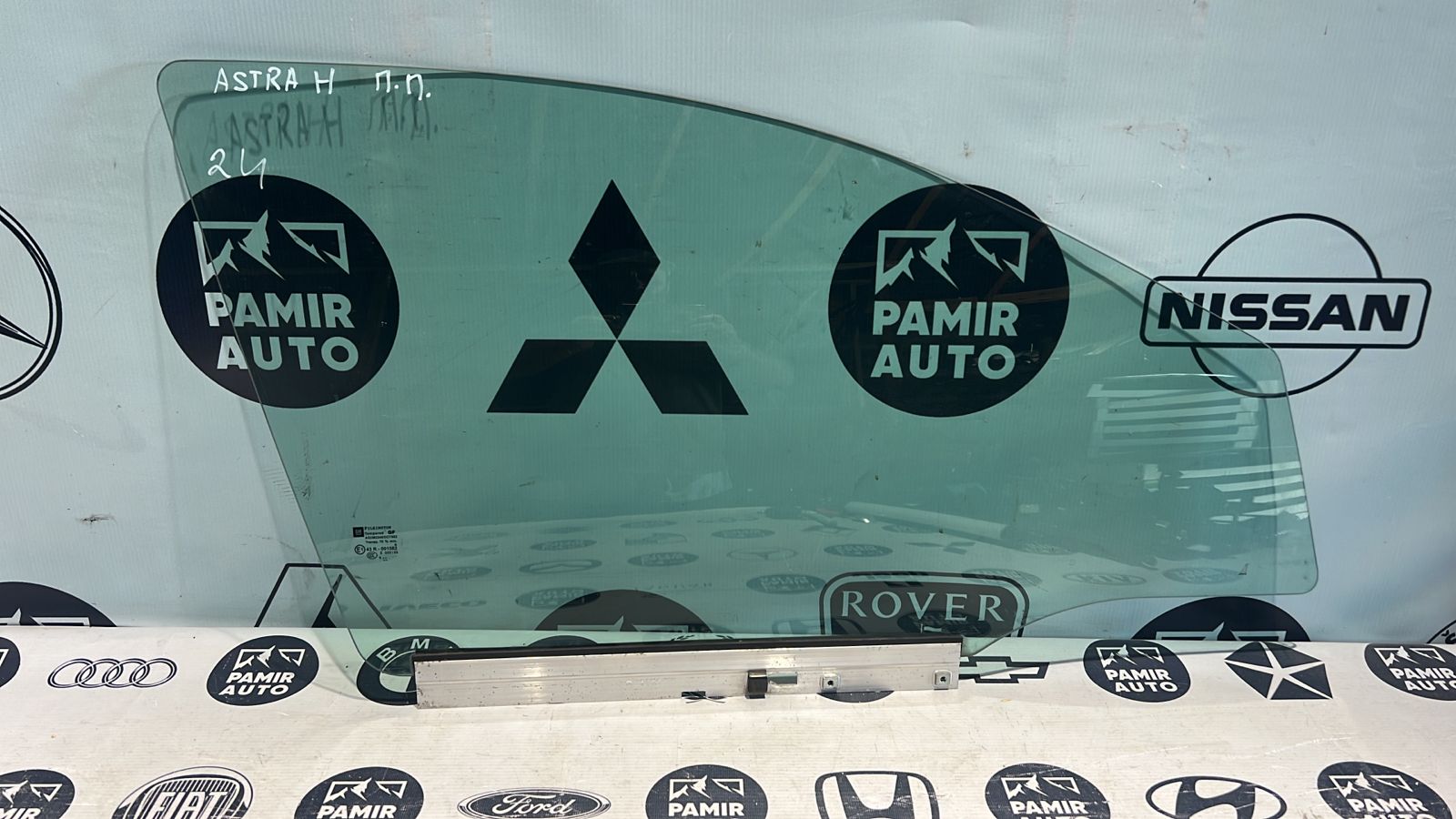 Стекло двери переднее правое Opel Astra/H 2004-2014