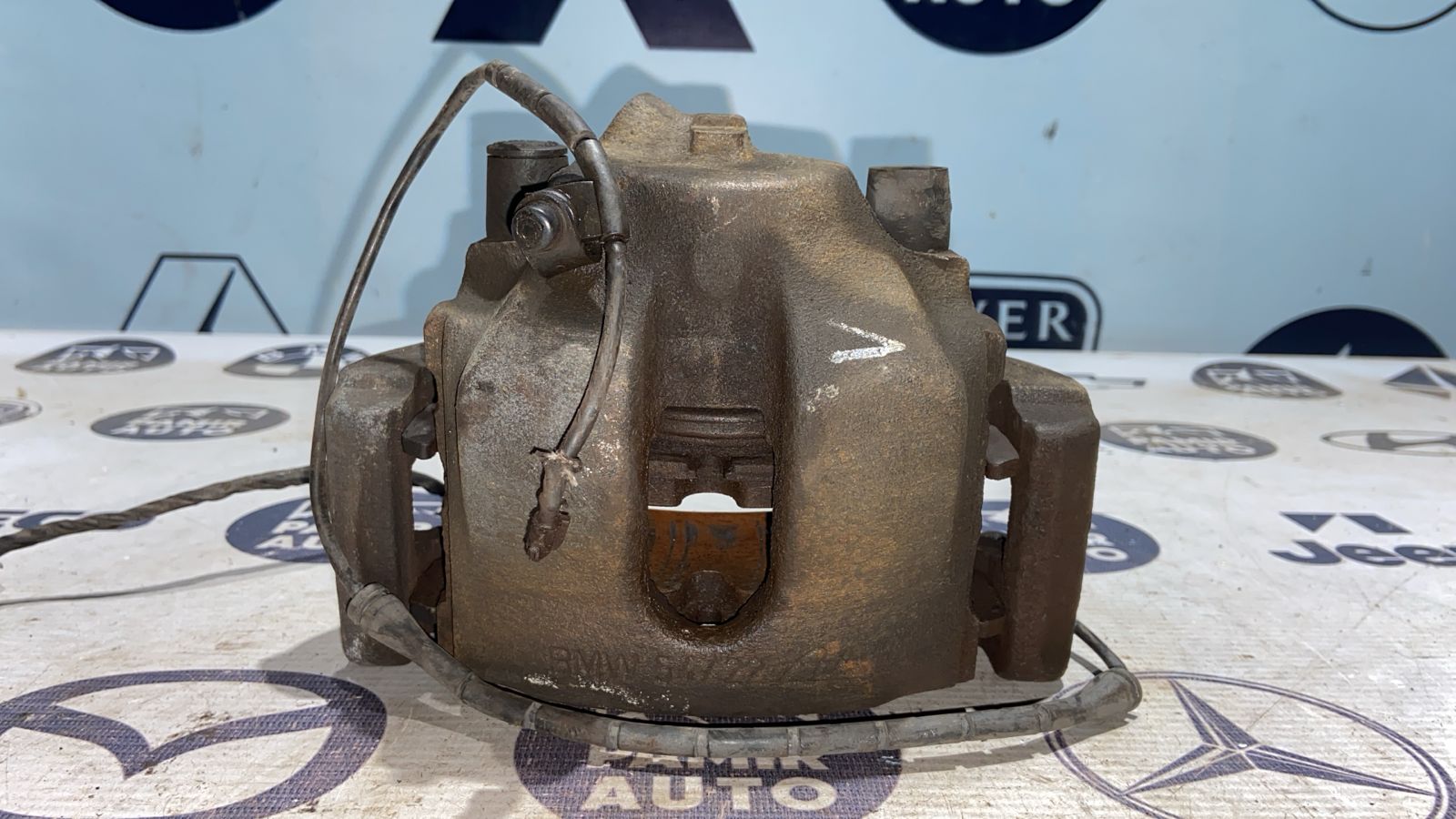 Суппорт передний левый BMW 3/E46 1998-2007