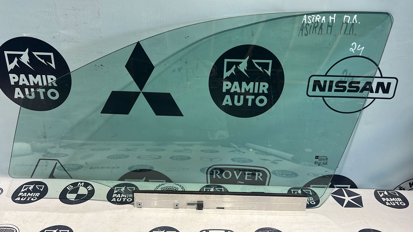 Стекло двери переднее левое Opel Astra/H 2004-2014