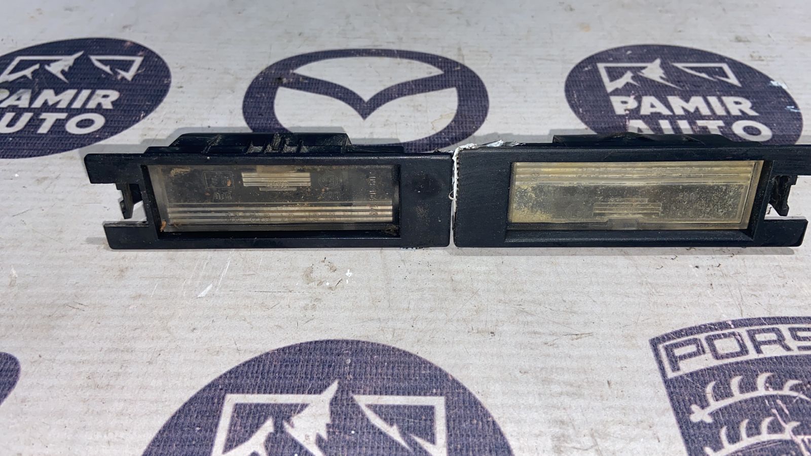 Фонарь подсветки номера Opel Zafira/B 2005-2014