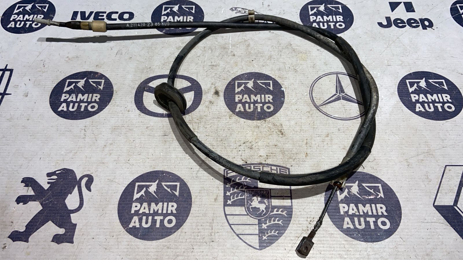 Трос стояночного тормоза левый Mercedes E/W211 2002-2009