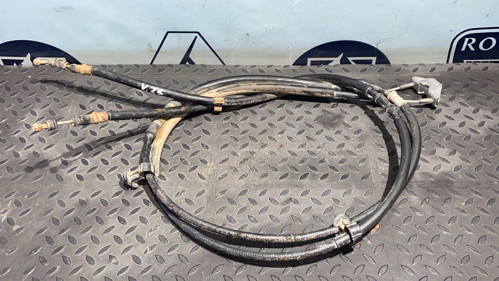 Трос стояночного тормоза Opel Zafira/B 2005-2014