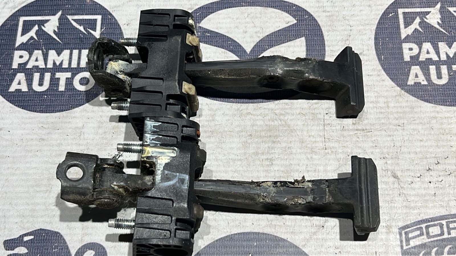 Ограничитель двери задний Opel Zafira/B 2005-2014