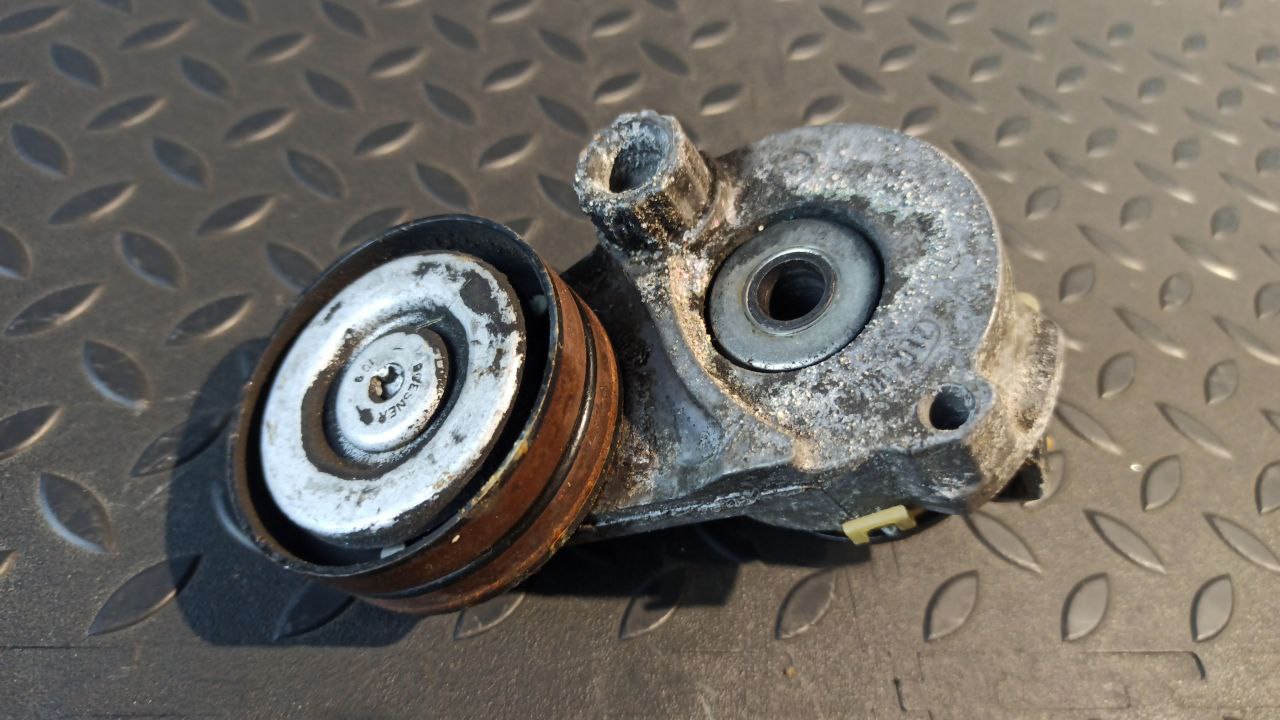 Натяжитель ремня Opel Astra/H 2004-2014