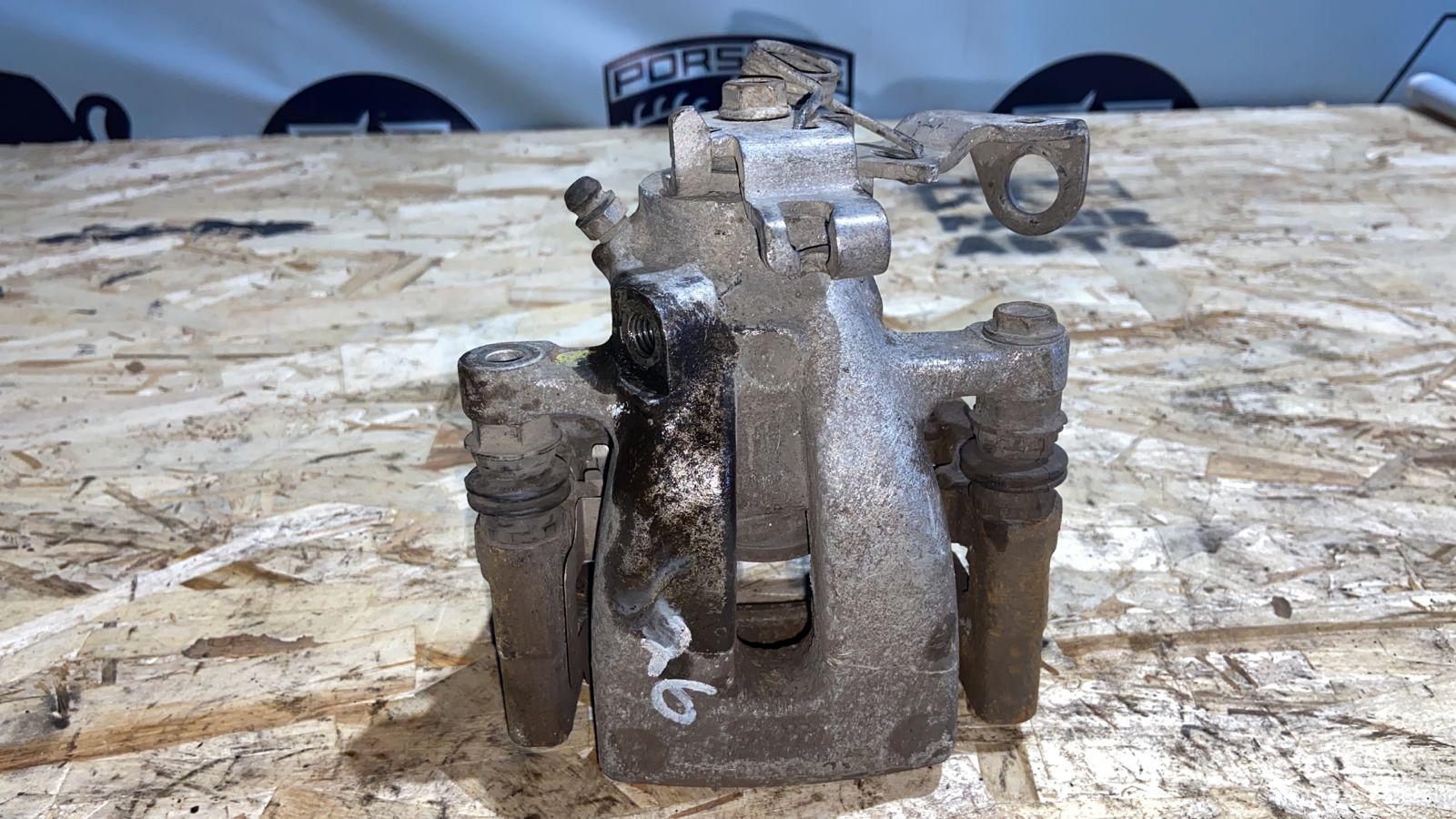 Суппорт задний левый Opel Zafira/B 2005-2014