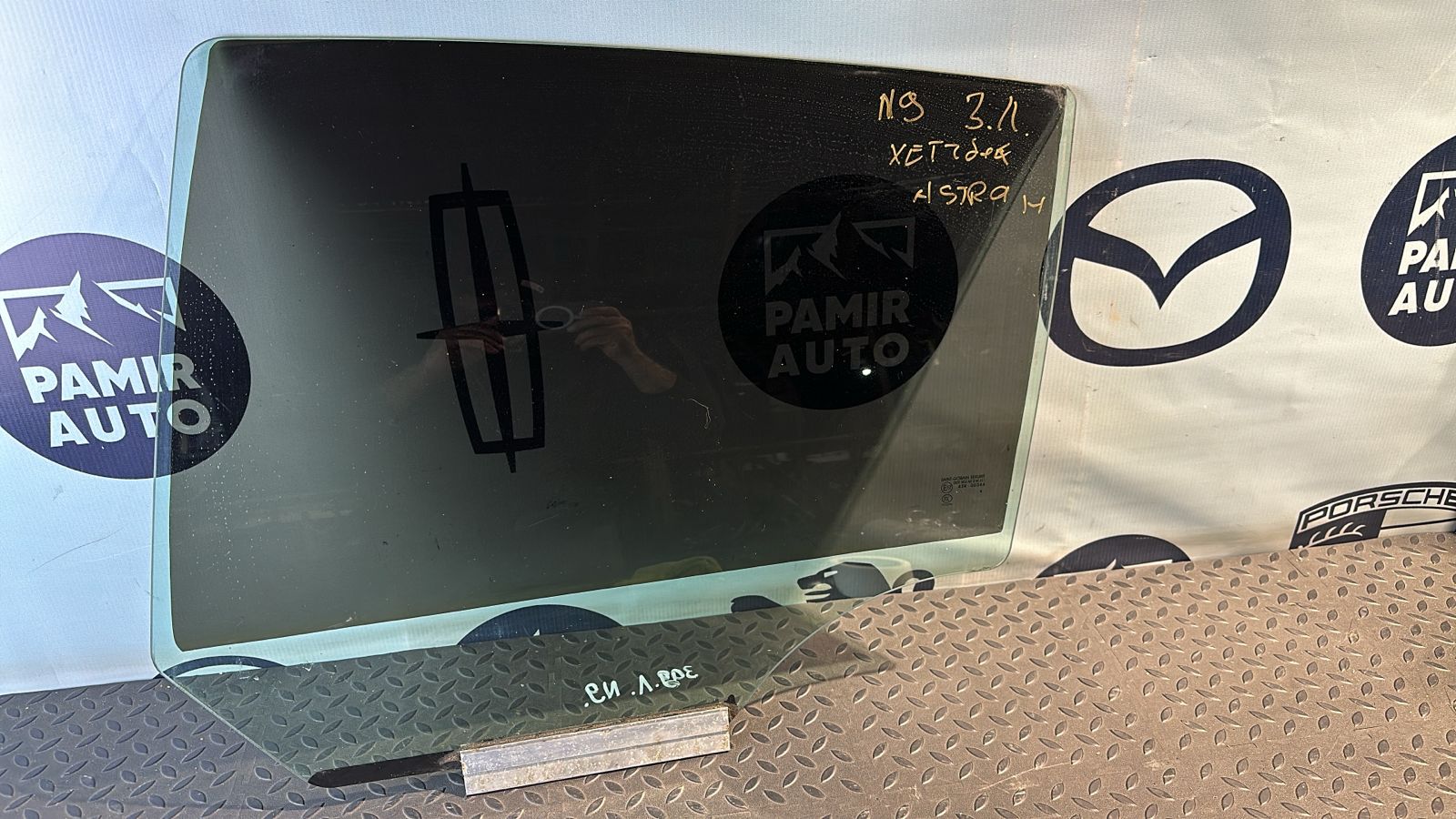 Стекло двери заднее левое Opel Astra/H 2004-2014