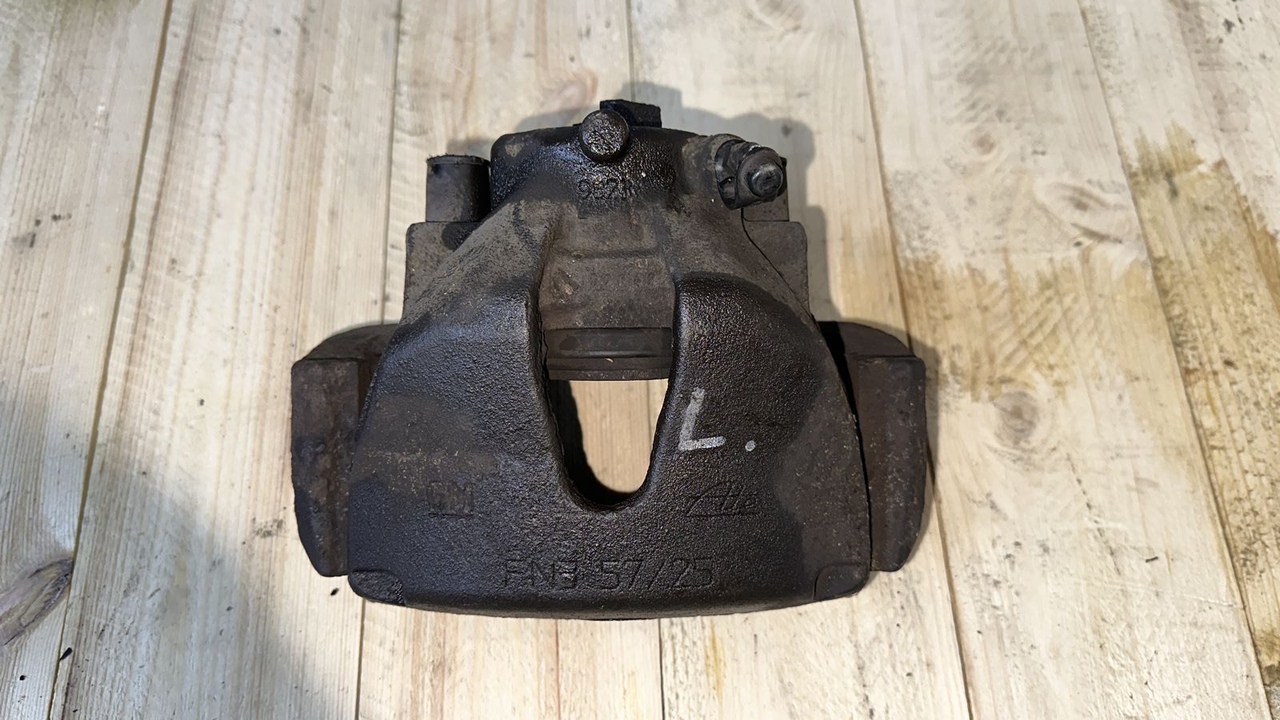 Суппорт передний левый Opel Astra/H 2004-2014