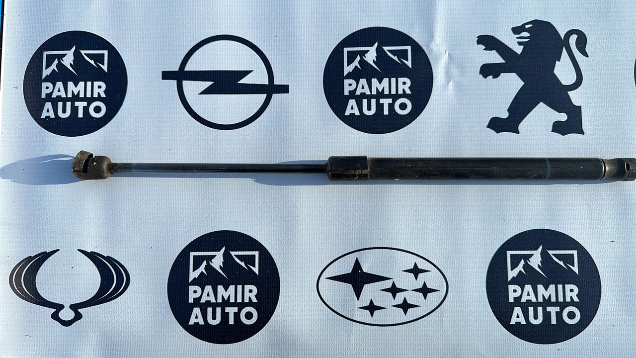 Амортизатор двери багажника Opel Astra/H 2004-2014