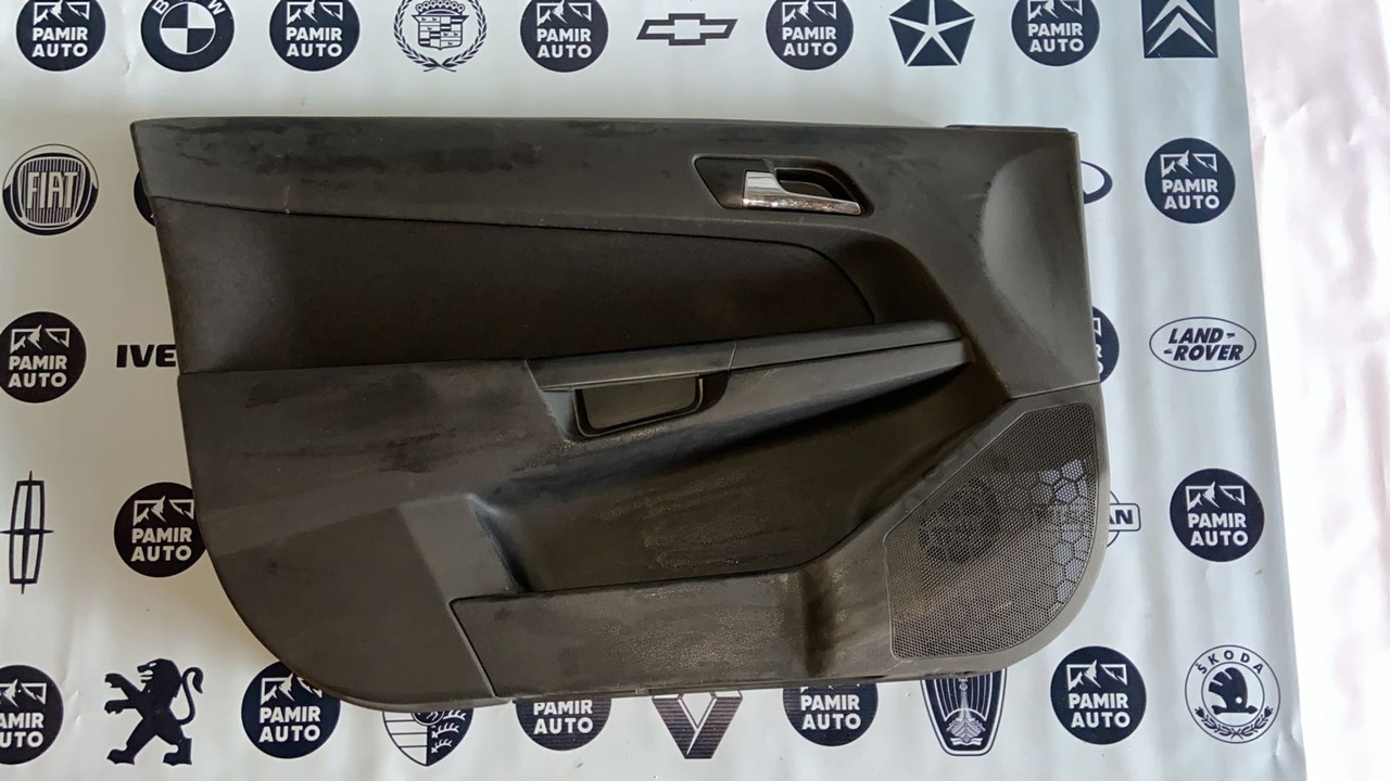 Обшивка двери передняя левая Opel Astra/H 2004-2014