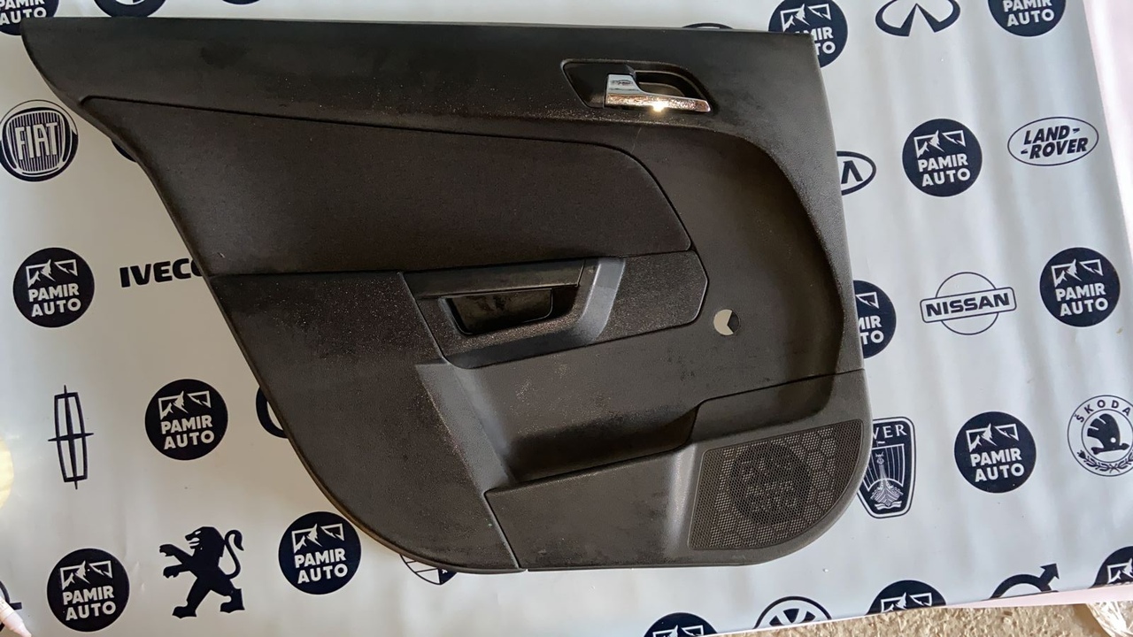 Обшивка двери задняя левая Opel Astra/H 2004-2014