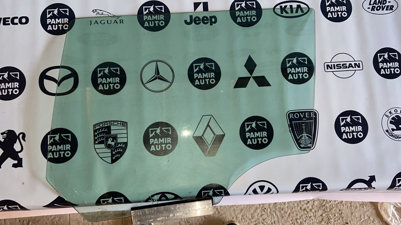 Стекло двери заднее левое Opel Astra/H 2004-2014