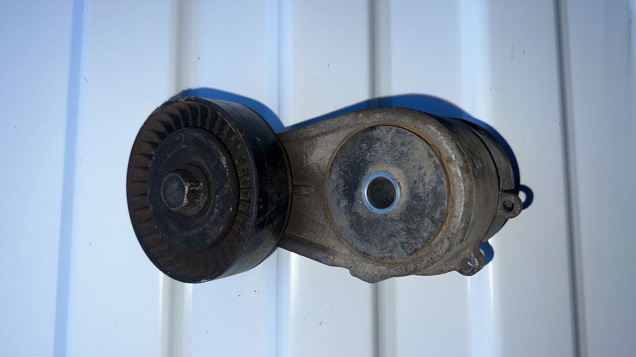 Натяжитель ремня Opel Astra/H 2004-2014