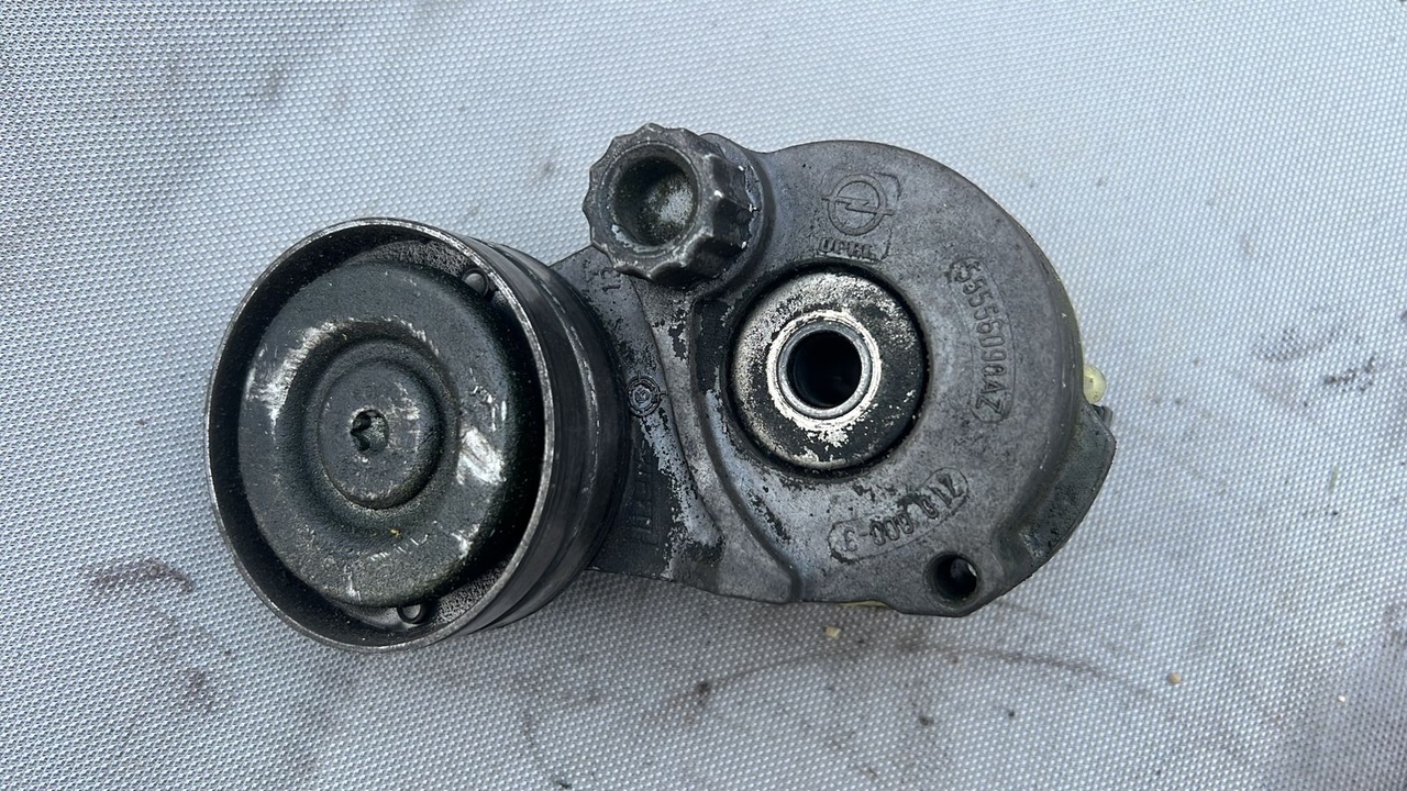 Натяжитель ремня Opel Astra/H 2004-2014