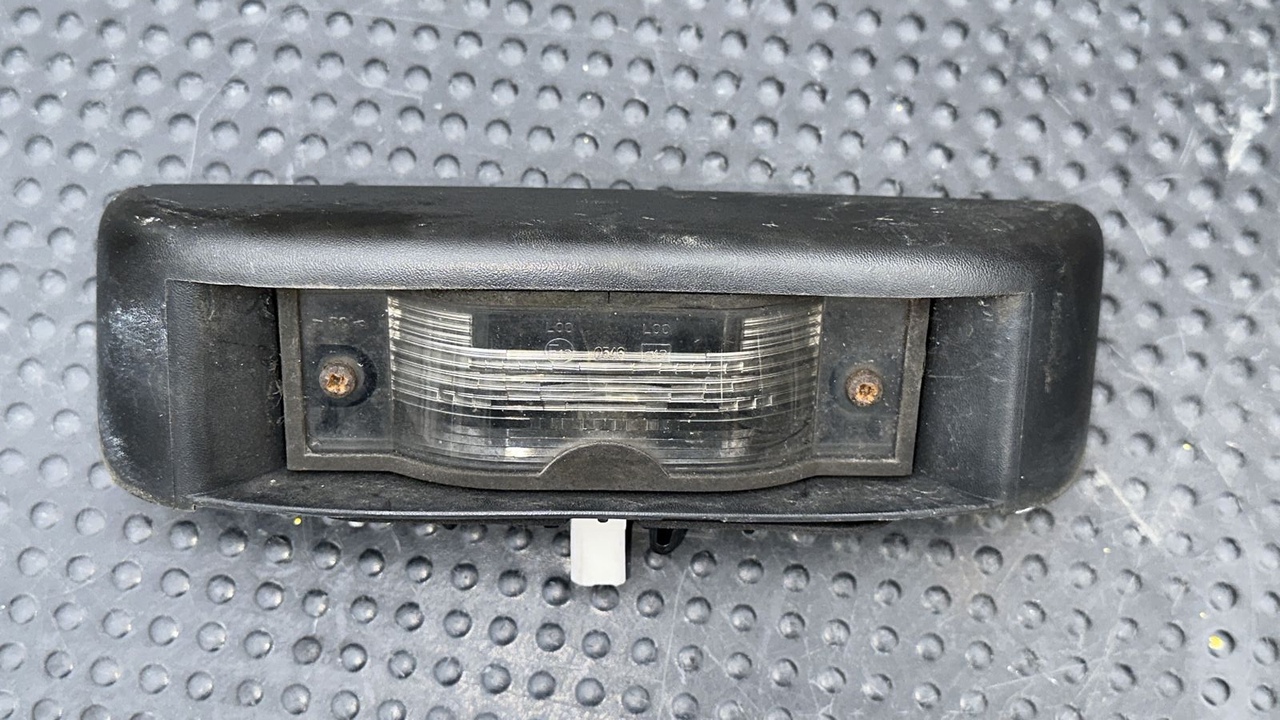 Фонарь подсветки номера Opel Vivaro/A 2001-2014