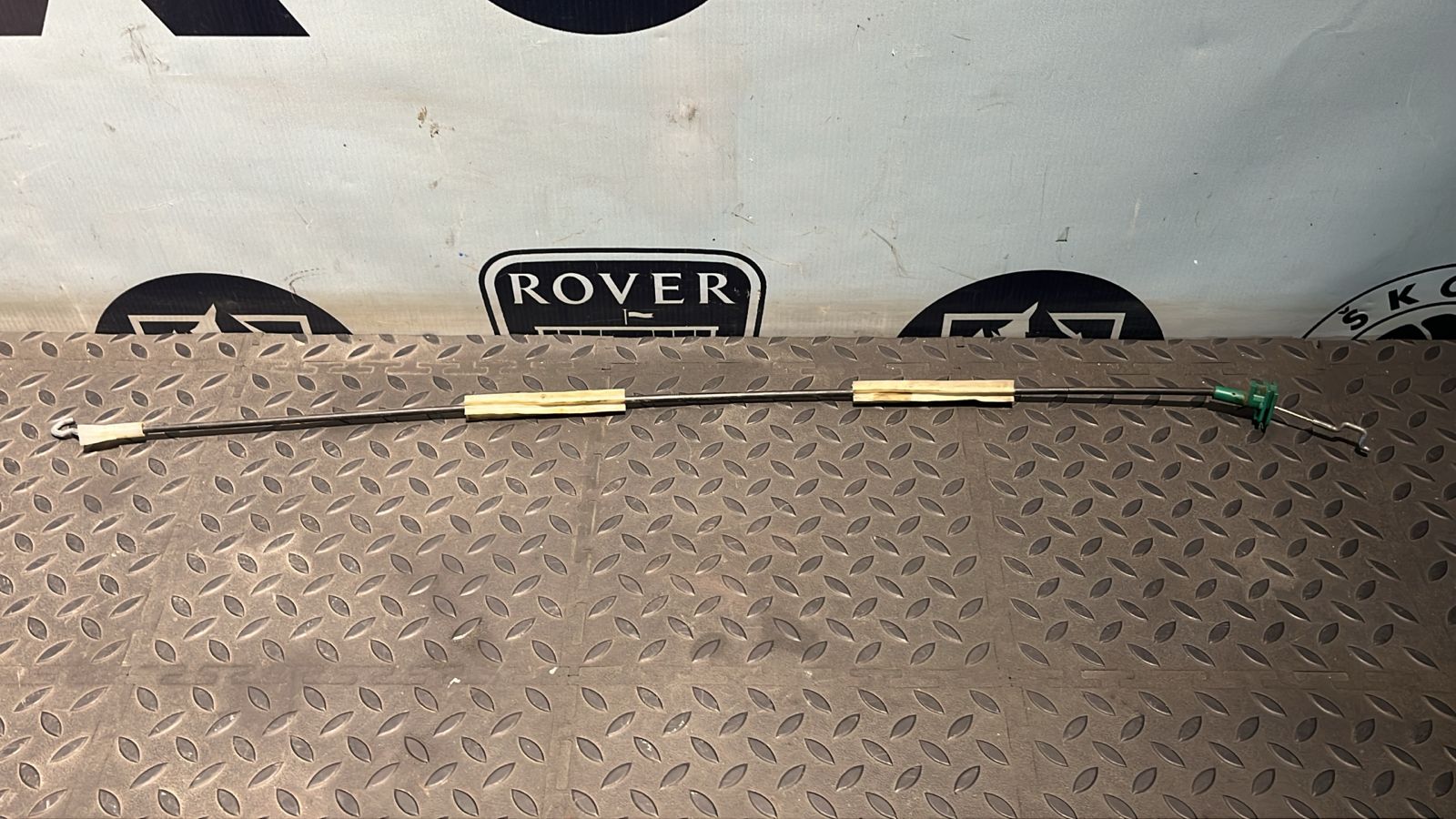 Трос замка двери передний Opel Astra/H 2004-2014