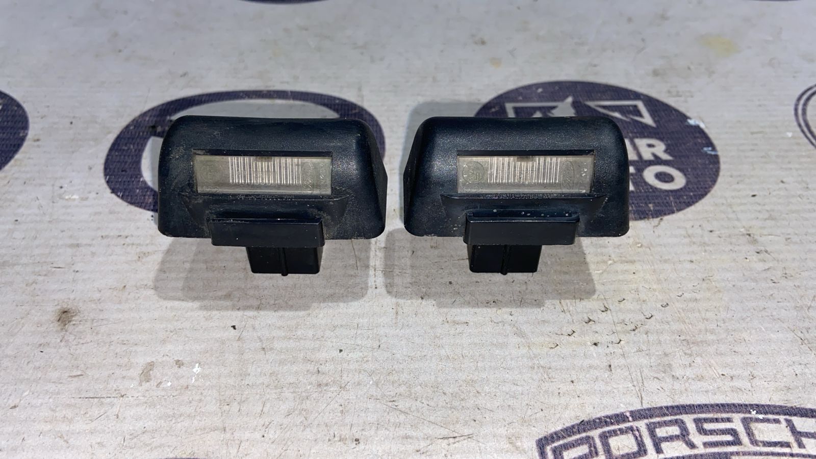 Фонарь подсветки номера Ford Transit 2000-2006