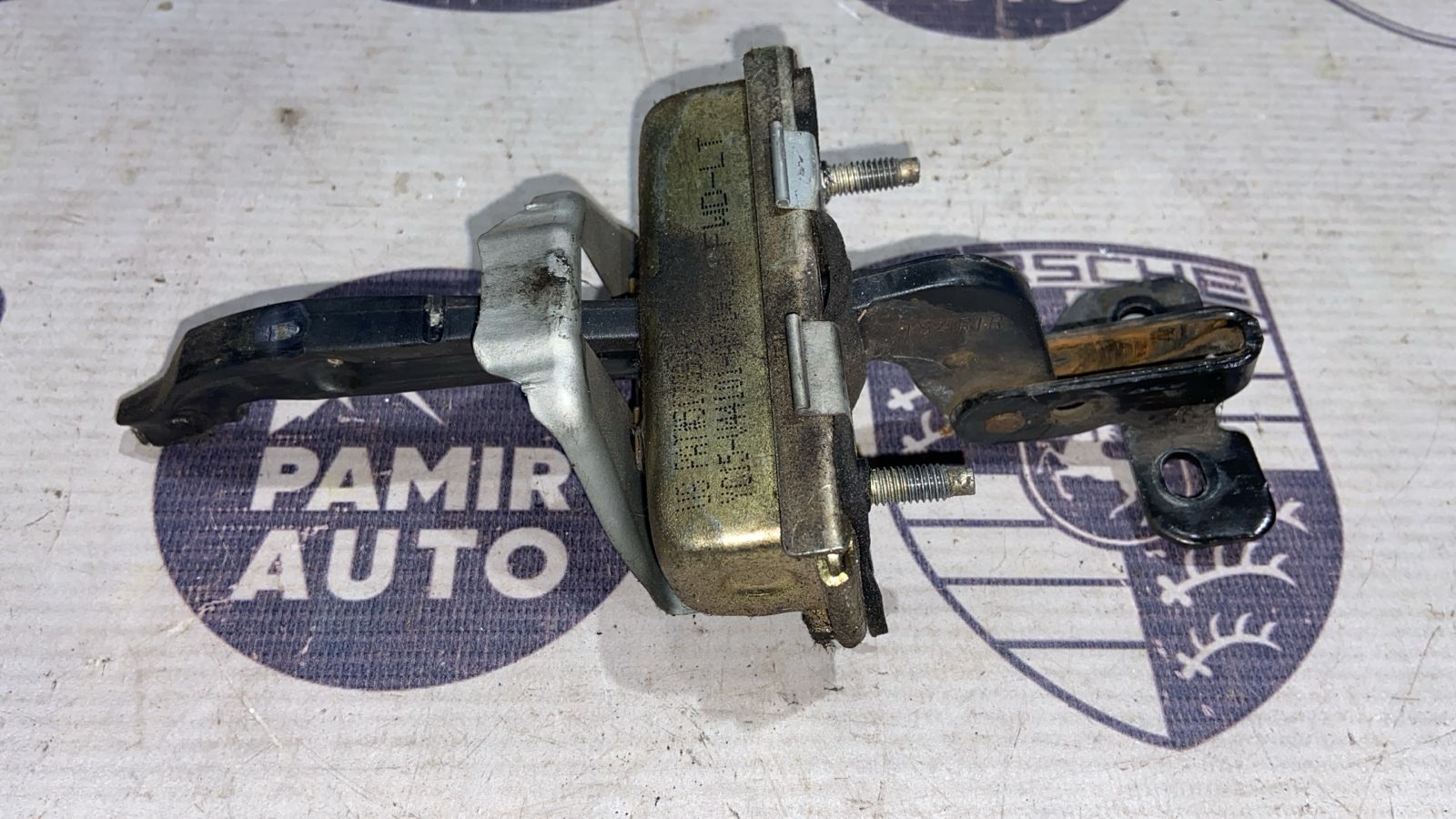 Ограничитель двери багажника левый Ford Transit 2000-2006