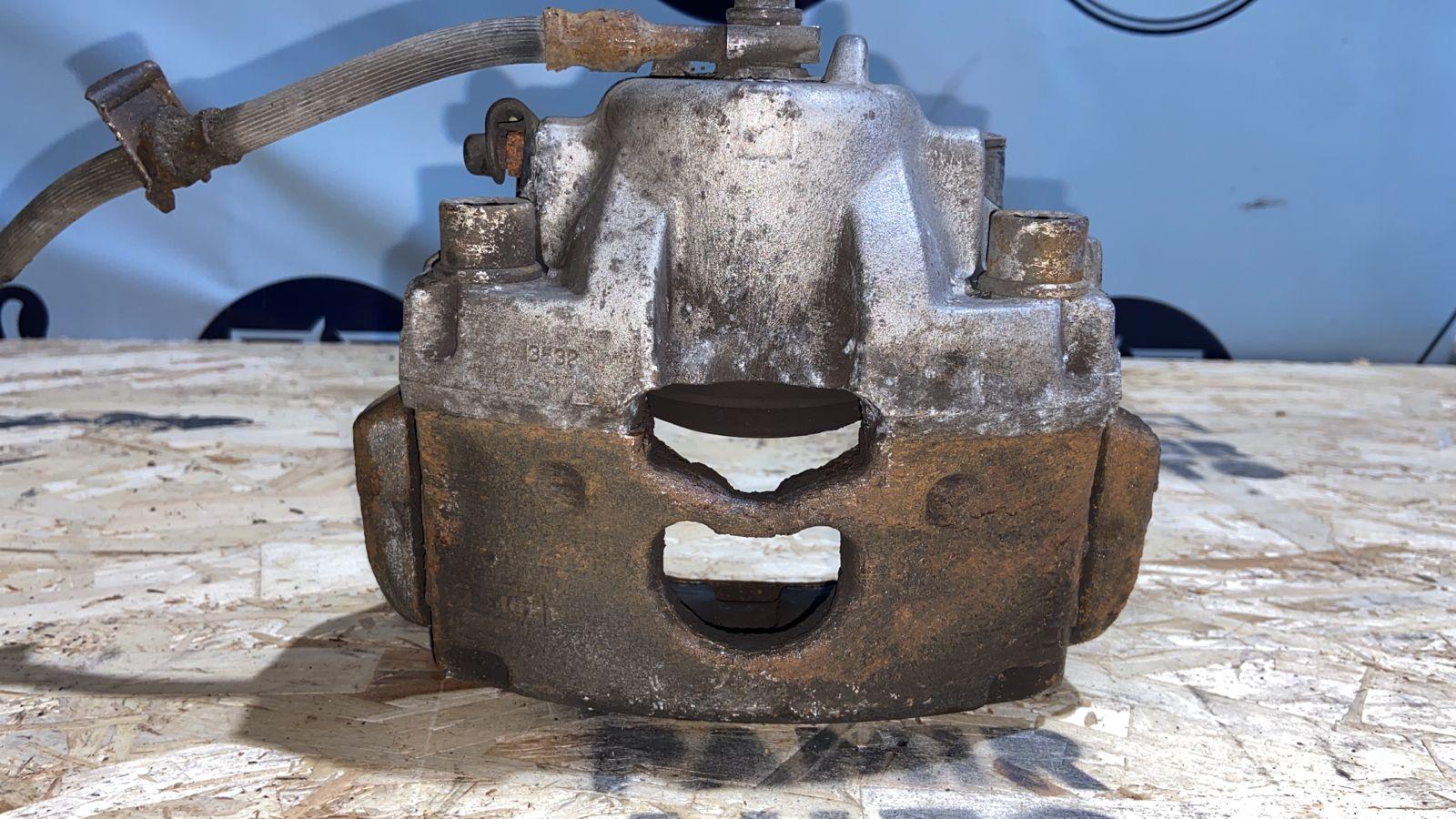 Суппорт передний правый Opel Vectra/C 2002-2008