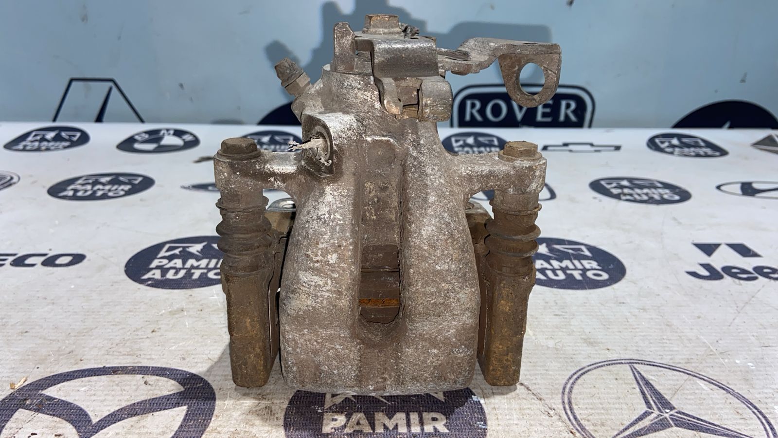 Суппорт задний левый Opel Astra/H 2004-2014