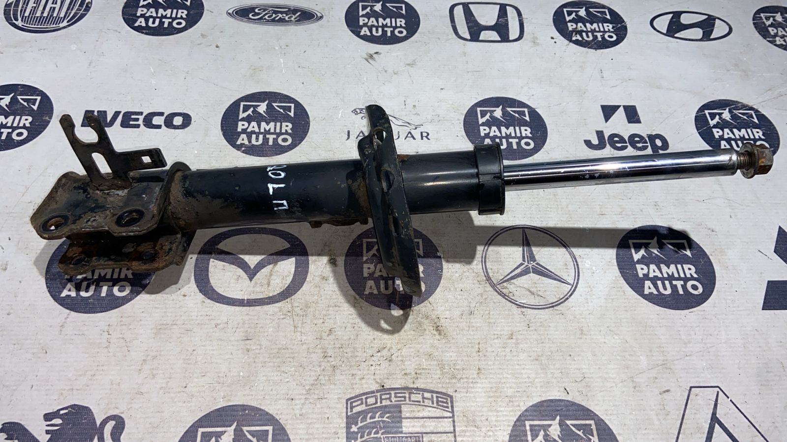 Амортизатор передний левый Opel Zafira/B 2005-2014