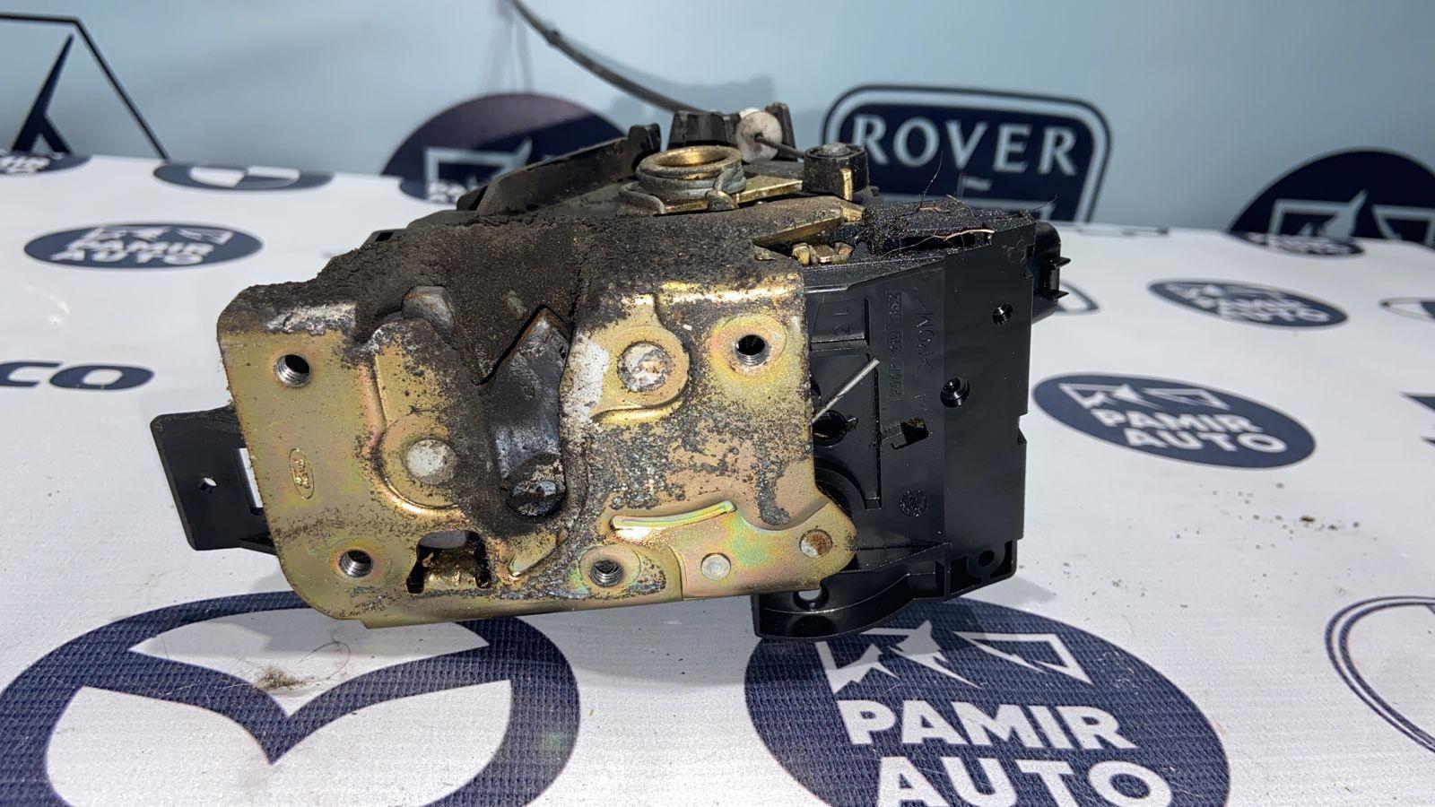 Замок двери задний левый Ford Focus 1998-2007