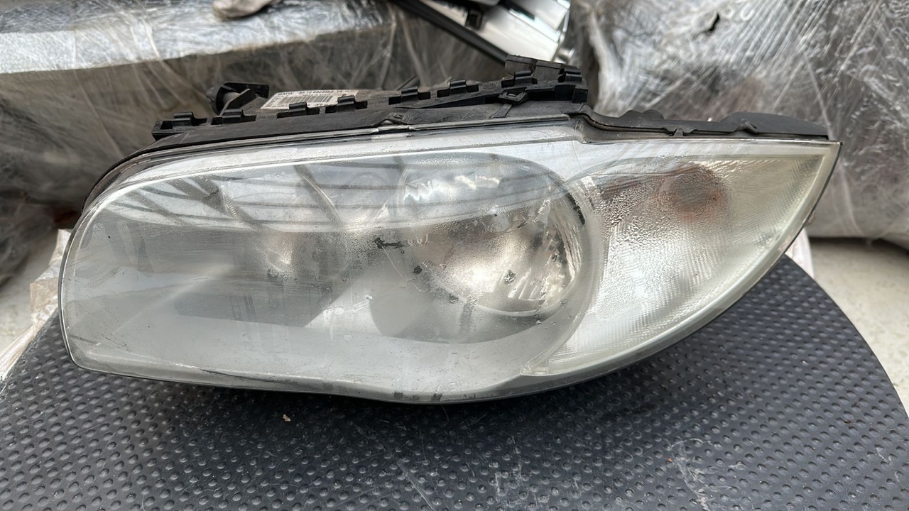 Фара левая BMW 1/E87 2004-2011