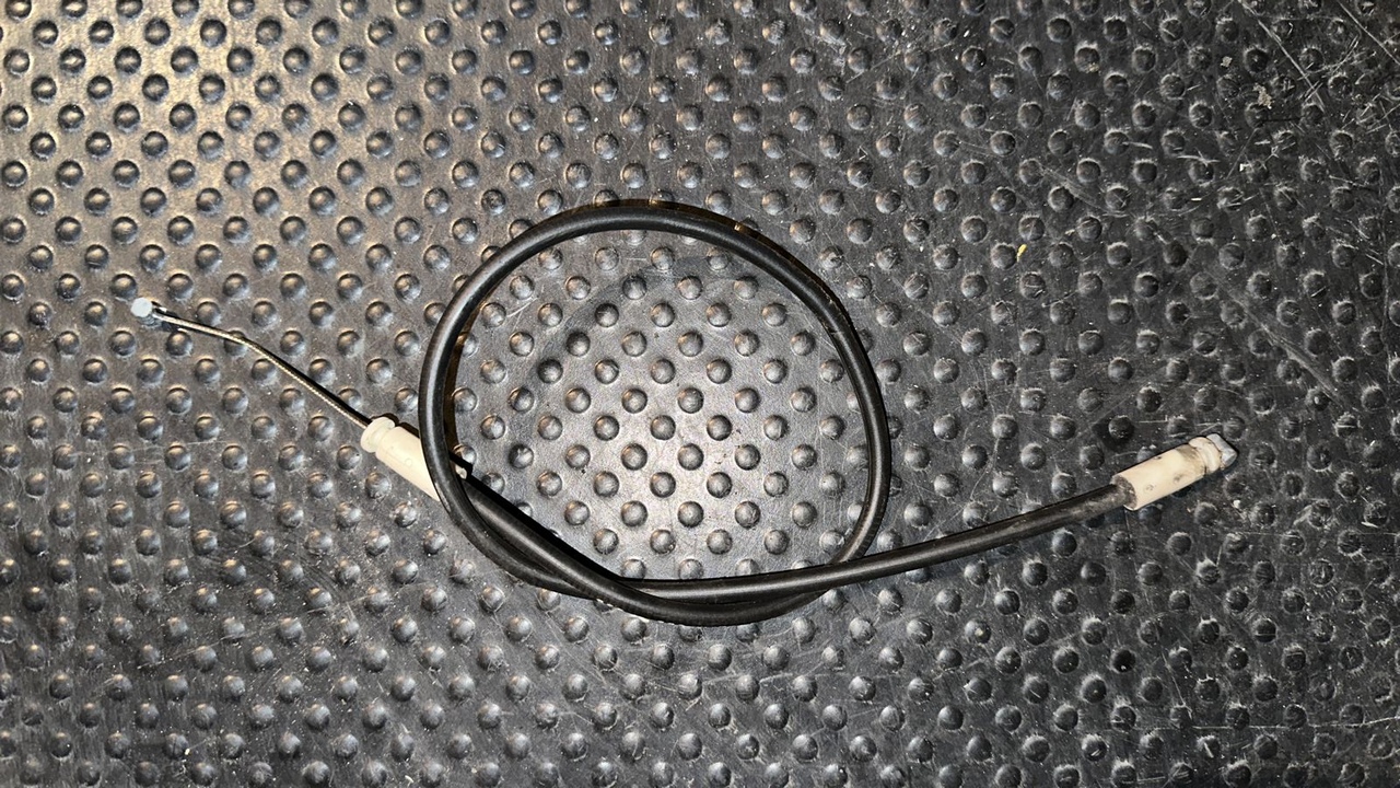 Трос замка двери багажника левый Opel Movano/A 2003-2010