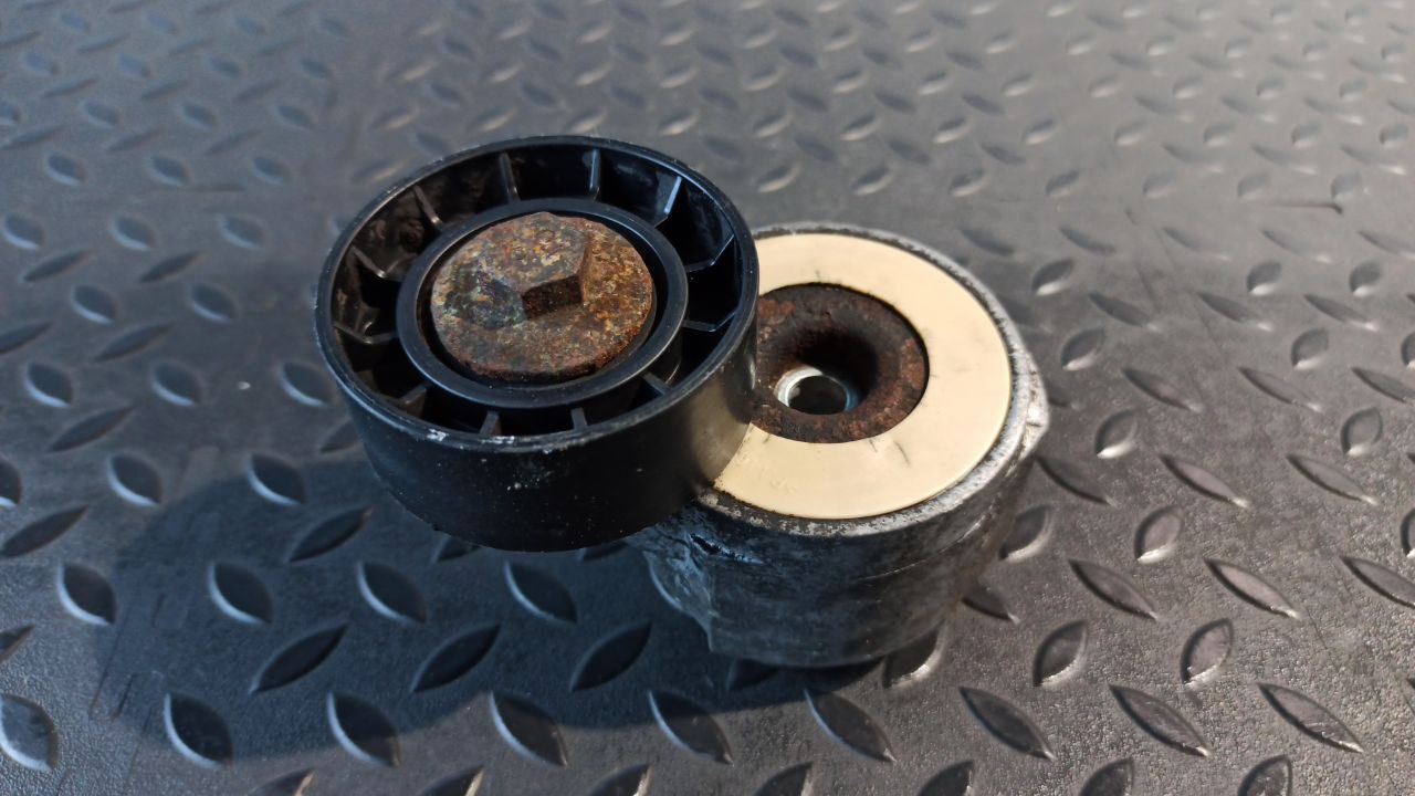 Натяжитель ремня Opel Zafira/B 2005-2014