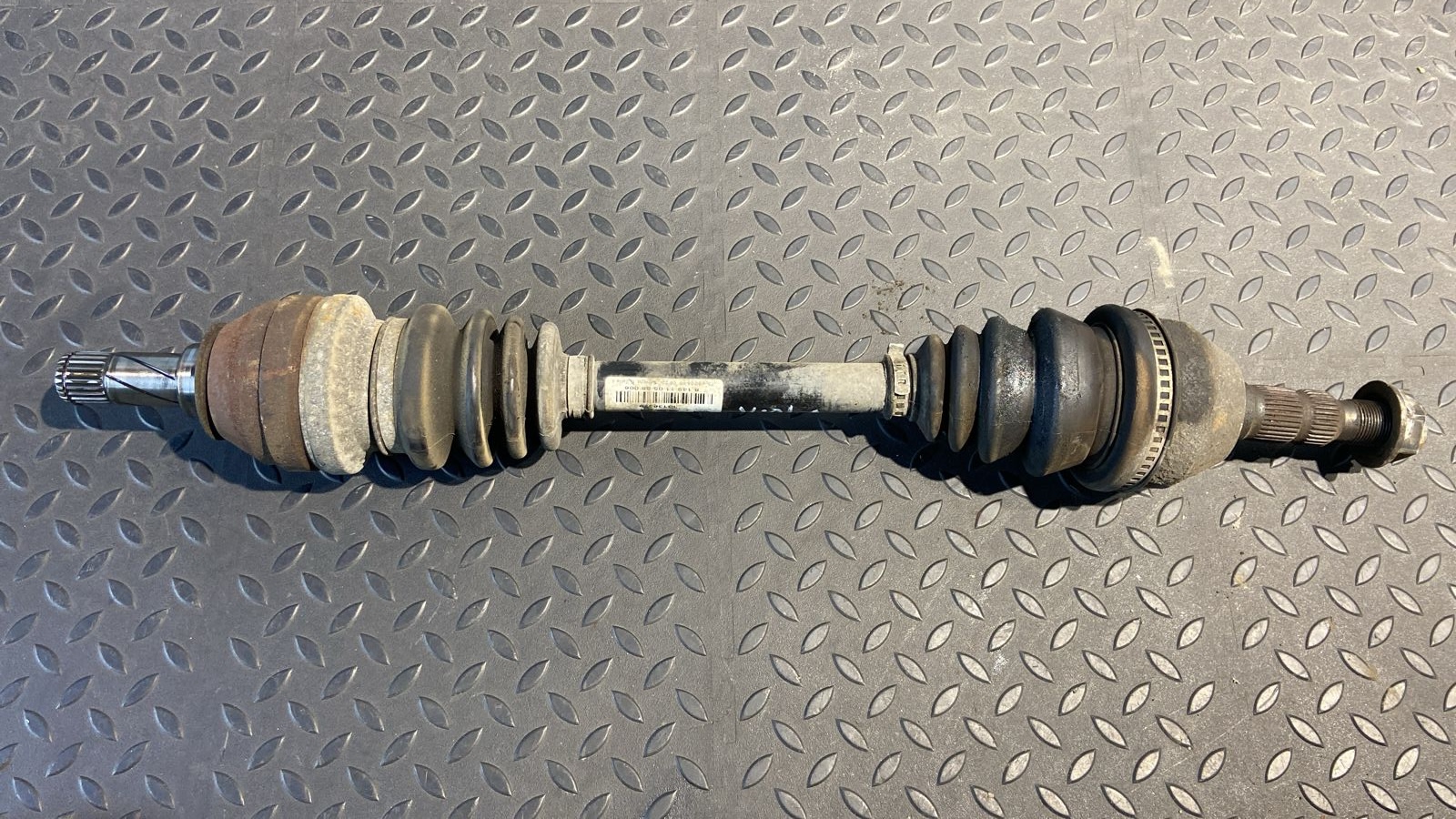 Полуось передняя левая Opel Astra/H 2004-2014