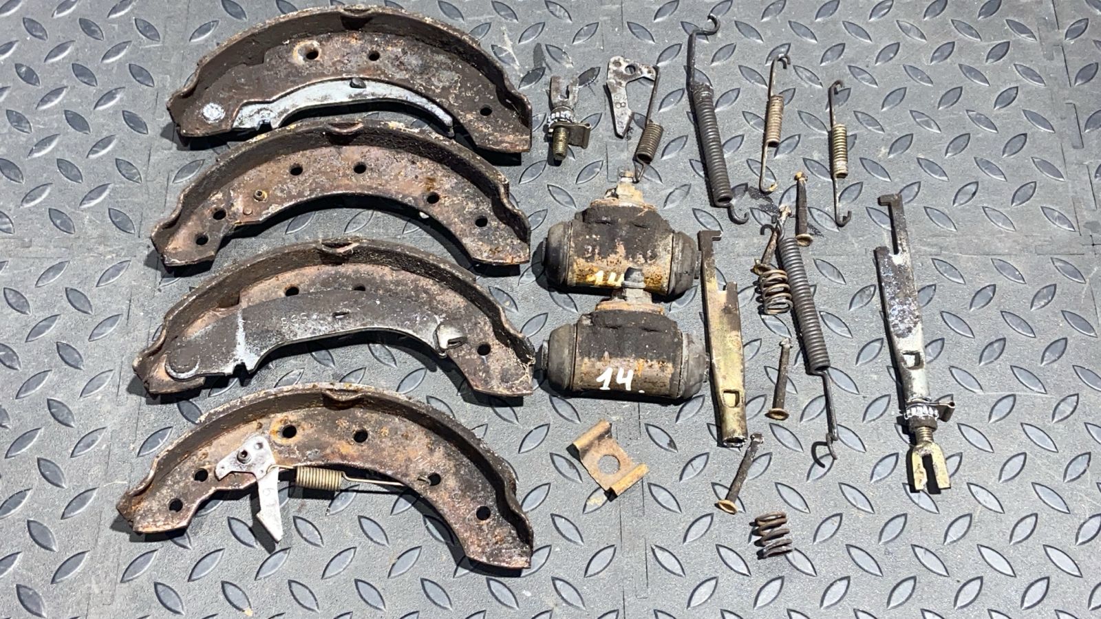 Механизм стояночного тормоза Renault Logan 2004-2015